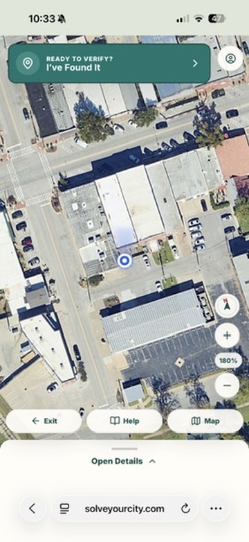 The Solve Your City player map with the I’m Where the Clue Leads location-verification control.